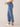 Mid Blue Denim Absolution Mid Rise Repreve Split Double Layer Fray Kick Flare Hem Jean