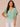 Light Winter Green Short Flutter Floral Die Cut Embroidered Sleeve Mixed Media Pointelle V-Neck Banded Hem Top