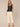 Navy Sleeveless Button Down Front Scallop Edge Embroidery V-Neck Cinched Waist Peplum Hem Woven Top