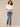 Off White Smock Short Sleeve Ruffle Shoulder Detail Round Neck Miced Media Woven Knit Top