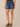 Blue Denim Absolution High Rise Embroidered Cascading D Pocket Clean Finish Fray Hem Petite Short