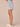 Light Blue Artisanal Denim Absolution High Rise Roll Cuff Spade Back Pocket Distress Whiskering Short