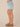 Light Blue Artisanal Denim Ableisure Skyrise Pull-On Drawstring Waist Micro Step Hem Side Slit Relaxed Short