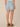 Light Blue Artisanal Denim Ableisure Skyrise Pull-On Drawstring Waist Micro Step Hem Side Slit Relaxed Short